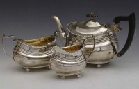 Lot 249 - Three-piece silver London shaped tea set, Nathan