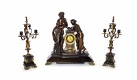 Lot 457 - A Victorian slate and bronze mantel clock