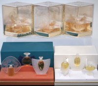 Lot 63 - Three Lalique boxed perfume sets, each containing