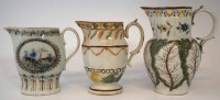 Lot 98 - Three Prattware jugs circa 1800, one with cabbage