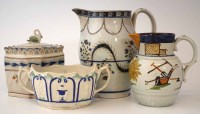 Lot 99 - Four pieces of Prattware, to include two jugs