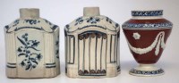 Lot 122 - Two pearlware tea caddies and a vase