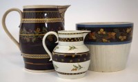 Lot 155 - Two pottery jugs and a plant pot