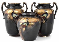 Lot 223 - Garniture of three Thomas Foresters Phoenix ware vases