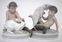Lot 236 - Two Royal Copenhagen Fauns, modelled with pet