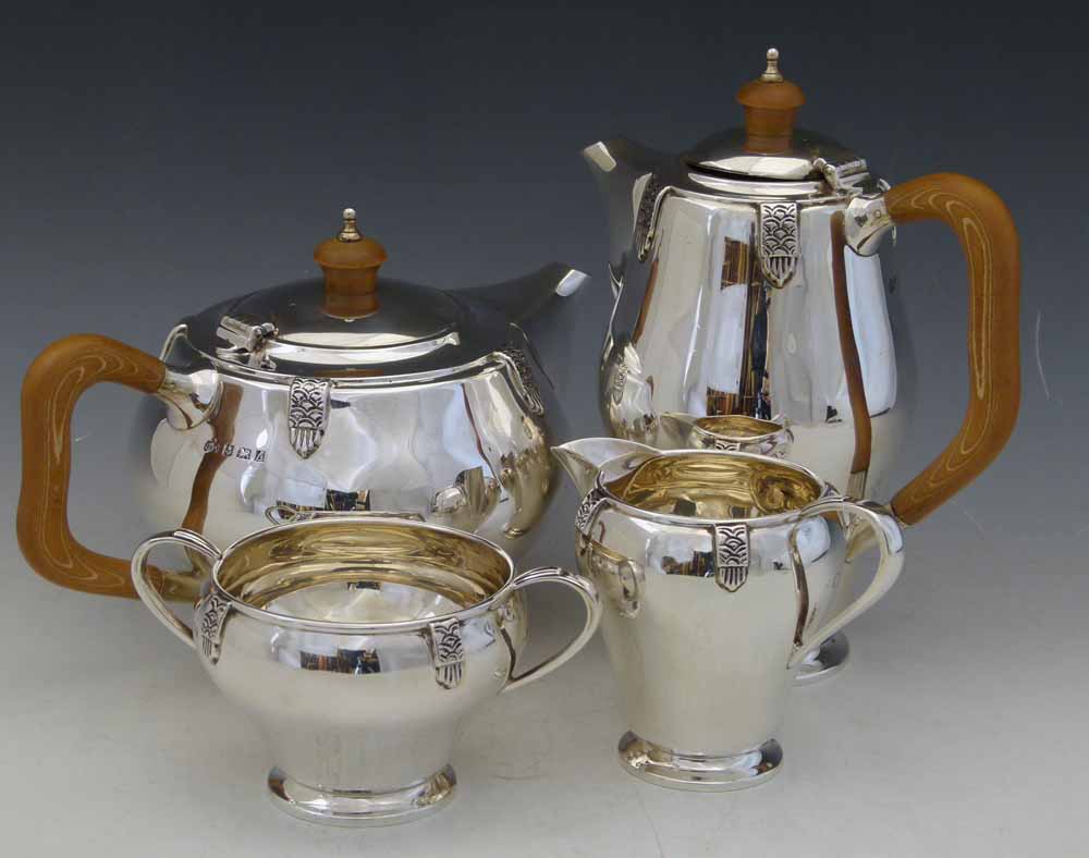 Lot 317 Elkingtons silver four piece tea set.