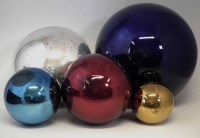 Lot 90 - Five witches ball Victorian glass balls, largest