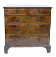 Lot 556 - Late 18th century walnut veneered chest of two short and three long graduated drawers