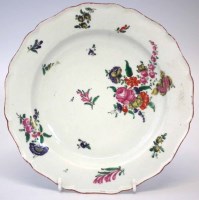 Lot 141 - Chelsea plate circa 1755, painted with floral sprays, red anchor painted to the base, 22.5cm diameter