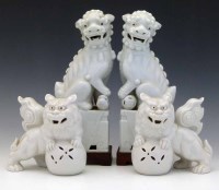 Lot 301 - Pair of Chinese white glazed lions of fo and