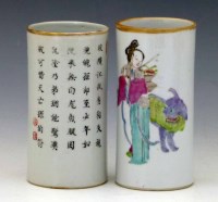 Lot 302 - Pair of Chinese famille rose cylindrical vases.