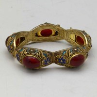 Lot 315 - Enamel and cabochon bracelet