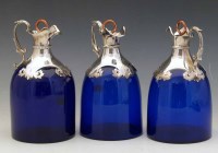 Lot 348 - Three Bristol blue spirit decanters.