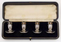 Lot 369 - Cased set of four silver owl place or menu