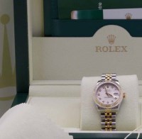 Lot 447 - Rolex Ivory Sunbeam Oyster Perpetual DateJust