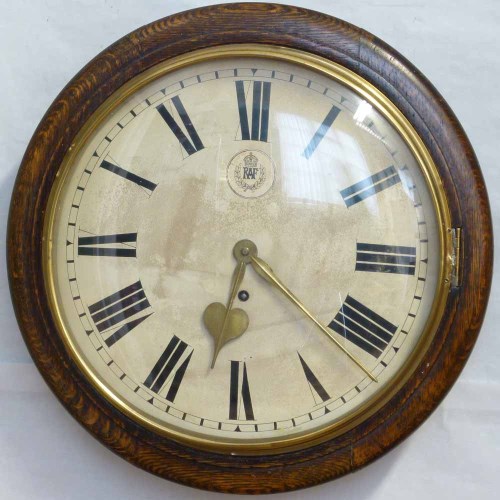 Lot 693 RAF oak cased wall clock.