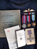 Lot 31 - A fine Second World War Bomber Command operations D.F.C. group of four awarded to 1076882 Flight Lieutenant Lewis H. Hemming, together with Log Book.