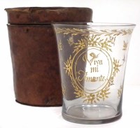 Lot 62 - Glass beaker in leather cup.