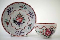Lot 84 - Baddeley-Littler teabowl and saucer, circa 1780-85, painted with scattered flowers  within pink border, (2)