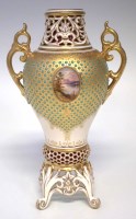 Lot 220 - Coalport jewelled twin handled vase.