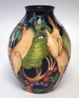 Lot 256 - Moorcroft vase, decorated with boxing hares