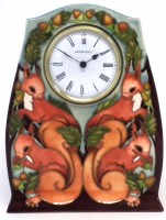Lot 268 - Moorcroft trial clock, decorated with red
