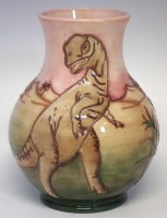 Lot 274 - Moorcroft vase, decorated with Dinosaurs after