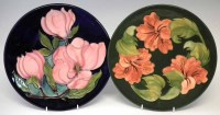 Lot 291 - Two Moorcroft chargers, decorated with Hibiscus