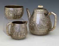 Lot 319 - Indian silver three-piece tea set by Grish