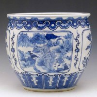 Lot 338 - Kangxi style blue and white jardiniere, 19th