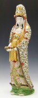 Lot 343 - Japanese porcelain figure of a Deity.