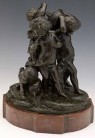 Lot 514 - Bronze figure group of three cherubs.