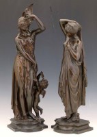 Lot 515 - Pair of bronze figures.