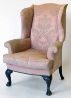 Lot 530 - Winged chair.