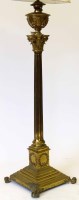 Lot 544 - Victorian brass standard lamp.