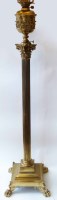 Lot 545 - Victorian brass standard lamp.