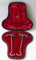 Lot 547 - Pair of cased boot pulls, supplied by Edmond