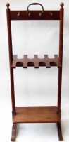 Lot 548 - Mahogany boot rack.