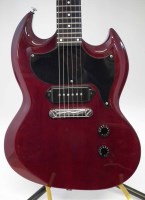 Lot 45 - Patrick Eggle SG electric guitar with stand.