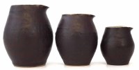 Lot 213 - Three Lucie Rie jugs.