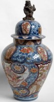 Lot 234 - Japanese lidded vase.
