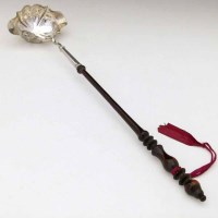 Lot 252 - George III silver punch ladle.