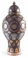 Lot 114 - Large Persian / Iznik pottery lidded vase