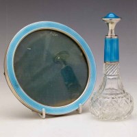 Lot 271 - Silver and enamel bottle and photo frame.