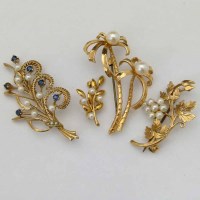 Lot 298 - Sapphire and pearl foliage spray brooch and three