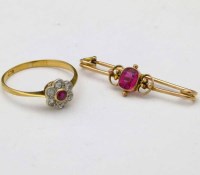 Lot 332 - 9ct gold red stone bar brooch and a ruby and