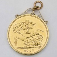 Lot 335 - Mounted gold five pounts, 2000.