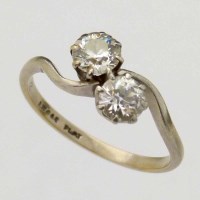 Lot 358 - Platinum and diamond cross-over ring, old
