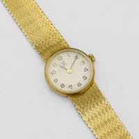 Lot 364 - Omega 18ct gold lady's bracelet watch, 1965
