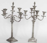 Lot 153 - Pair of plated candelabras.